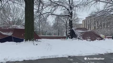 Winter storm leaves homeless tent city buried in snow | 9news.com