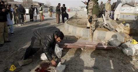 Bombing at Pakistan market kills more than a dozen as school attack anniversary nears - CBS News