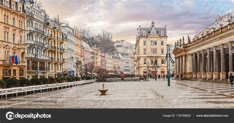 KARLOVY VARY, CZECH REPUBLIC - DECEMBER 2017: People at winter walking near Mlynska Colonnade ...