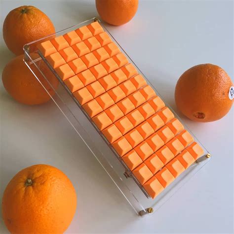 There's not enough orange keyboards. Especially one like this! JJ50 with custom acrylic and ...