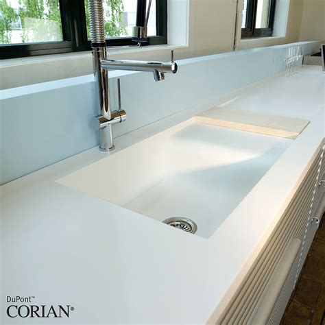 corian white kitchen with bespoke sink … Corian Bathroom, Corian Sink ...