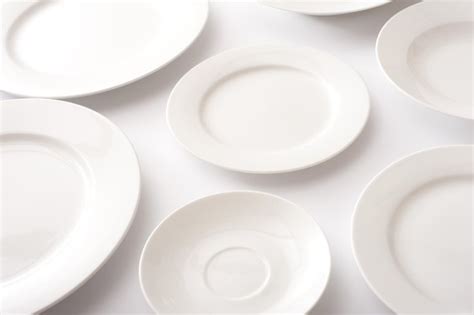 Assorted clean generic white plates - Free Stock Image