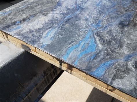 Man made granite countertops. Epoxy with blue flame highlights. | Blue ...