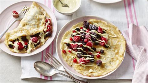 Pancakes with berries and white chocolate recipe - BBC Food