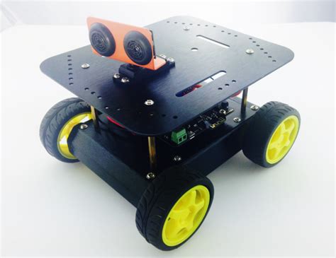 a small robot with wheels and yellow wheels on it's back legs, sitting ...