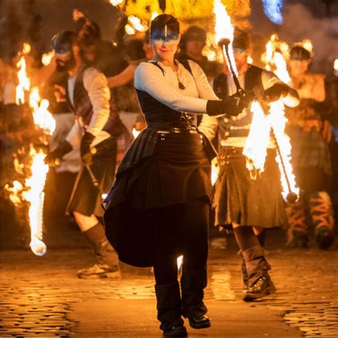 Torchlight procession fires up Edinburgh's Hogmanay celebrations - BBC News