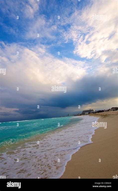 Turquoise surf on Cancun Beach Stock Photo - Alamy