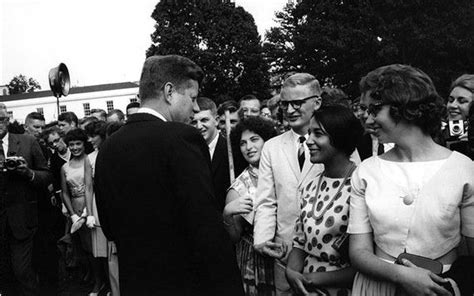 John F. Kennedy establishes the Peace Corps on March 1, 1961 ...