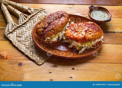 Mexican Pambazos with Green Sauce Stock Photo - Image of bread, salsa ...