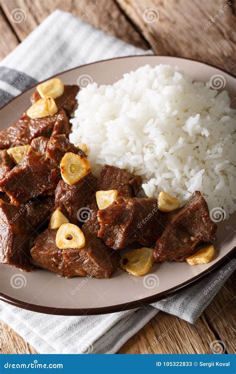 Philippine Beef Salpicao with Rice Garnish Closeup on a Plate. V Stock ...