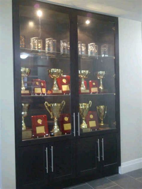 Our Trophy Showcase at the office | Trophy display shelves, Trophy ...