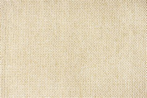 Close up texture of beige coarse weave upholstery fabric decorative textile background - Stock ...