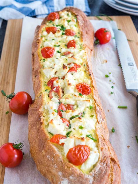 Tomato Feta Stuffed French Bread is so easy to make and bursting with fresh flavors! This bread ...