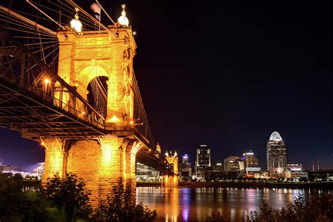 Roebling Bridge and Cincinnati Skyline at Night Photograph by Gregory Ballos