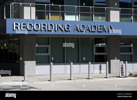 A logo sign outside of the headquarters of The Recording Academy in Santa Monica, California on ...