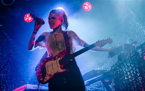 Grimes thinks Spotify should have a section for AI music - TGM Radio