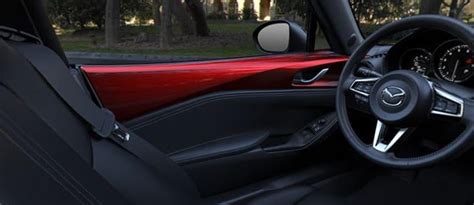 Red interior door trim on club spec ND : r/Miata