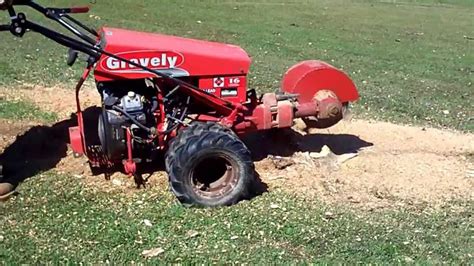 Gravely two wheel tractor stump grinder attachment part 2 - YouTube