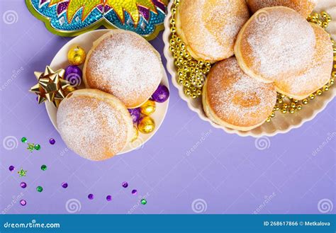 Mardi Gras King Cake Doughnuts or Donuts, Carnival Masks on Purple ...