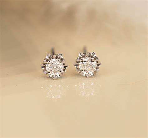 Diamond stud earrings sepvergara.com