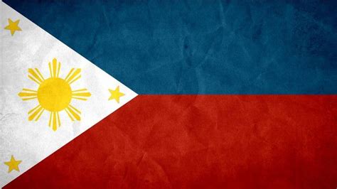 The National Flag of the Philippines displays a sun with eight rays ...