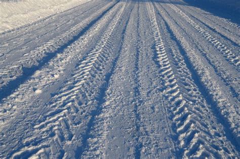 Car tire tread on snow stock photo. Image of trail, background - 152861402