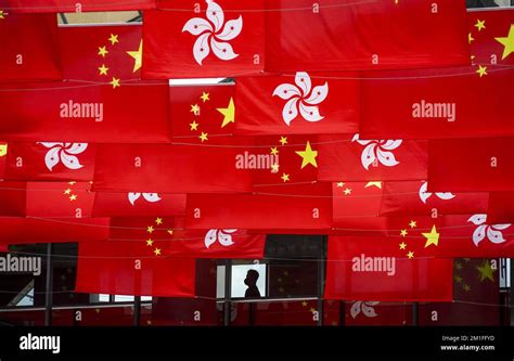 The flags of the PeopleHH Republic of China and of the Hong Kong SAR ...