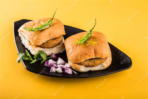 Premium Photo | Vada Pav OR Wada Pao is a vegetarian roadside fast food ...