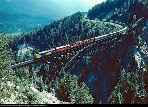 VIA’s eastbound Train 2 crosses Canadian Pacific’s famous Stoney Creek arch bridge on its ...