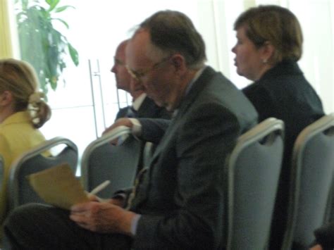 ESRI founder and president, Jack Dangermond diligently taking notes in a working session during ...