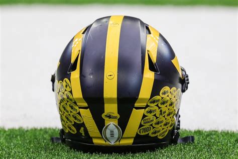 Michigan helmet stickers, explained: Why Wolverines players have decals ...