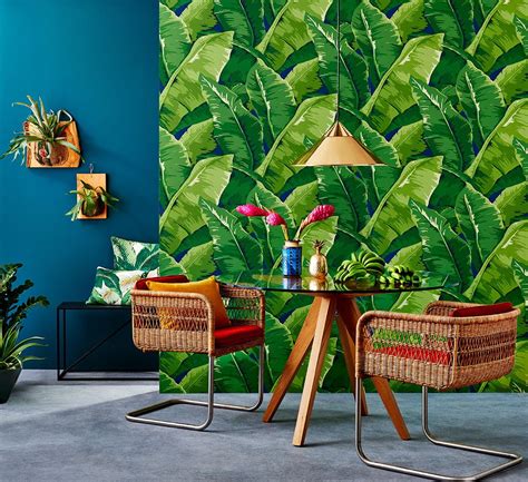 Bring this year's hottest interiors look home with palm leaf prints, brass accents, and rattan ...
