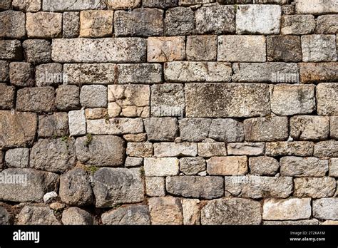 medieval stone block wall, texture for construction Stock Photo - Alamy