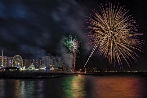 Coney Island Boardwalk Fireworks Photograph by Susan Candelario - Pixels