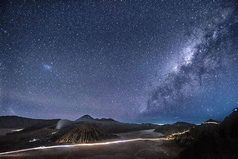 Mount Bromo volcano on night sky with milky way in Bromo