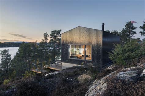 A Spruce-Clad Family Cabin in Norway Hugs Its Cinematic Landscape - Dwell