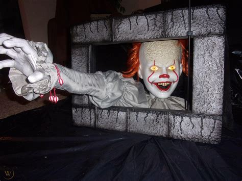 Props IT Pennywise Chapter 2 Animated Sewer Grabber Halloween Prop Party City Clown Current ...