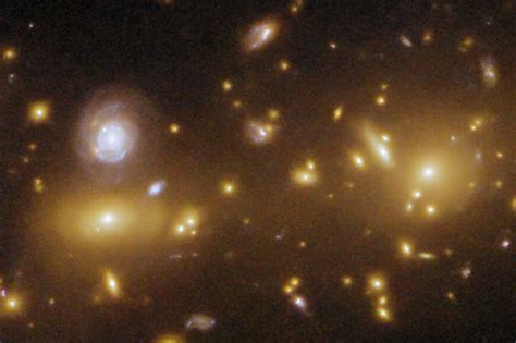 Hubble Space Telescope Observes at Least Two Galaxy Clusters Merging 8 ...