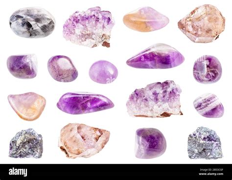 set of various Amethyst gemstones isolated on white background Stock Photo - Alamy