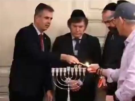 The day Milei was sworn in as President of Buenos Aires, he lit Menorah with families of ...