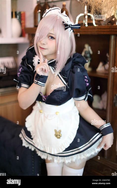 Japan anime cosplay portrait of girl with comic maid costume Stock Photo - Alamy