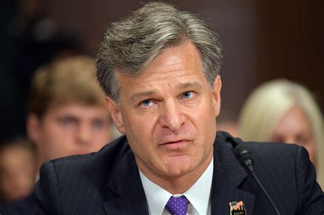 FBI Director Christopher Wray refuses to use term 'spying'