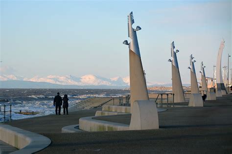 Cleveleys promenade with the snow capped hills of the Lake District ...