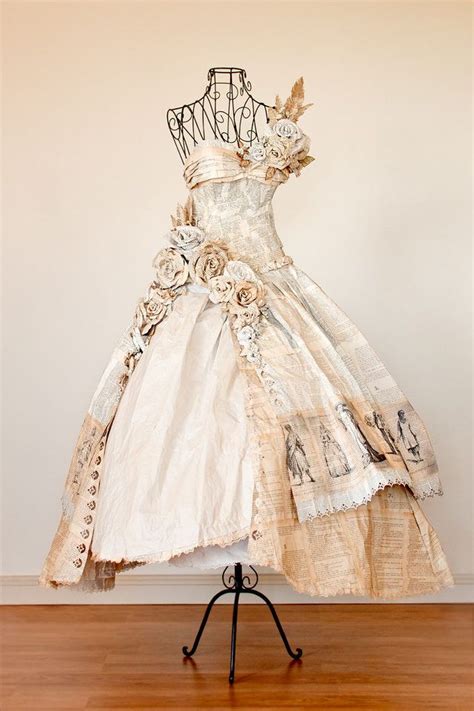 So I made this dress entirely out of book pages for a local art ...