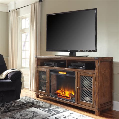 Signature Design by Ashley Tamonie Rustic Mango Veneer XL TV Stand with Electric Fireplace ...