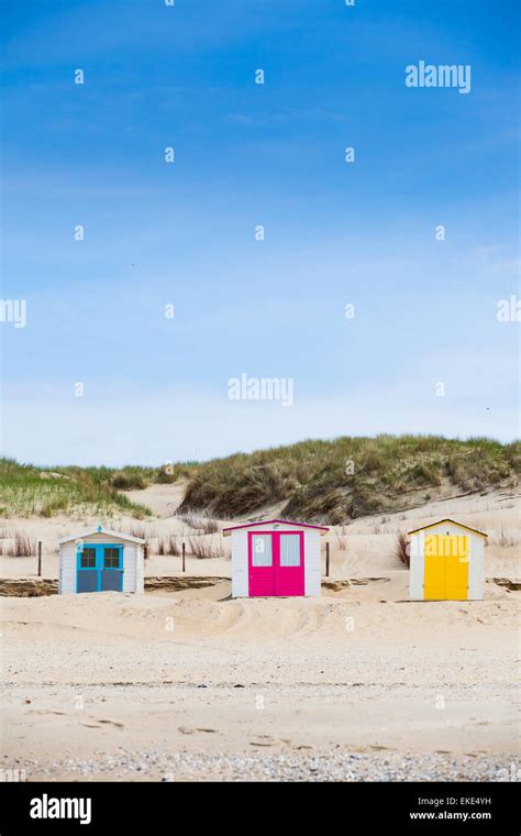 houses on the beach with blue sky Stock Photo - Alamy