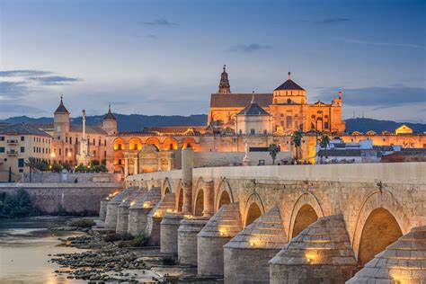 Cordoba, Spain at the Roman Bridge and Mosque-Cathedral - Facet Barcelona