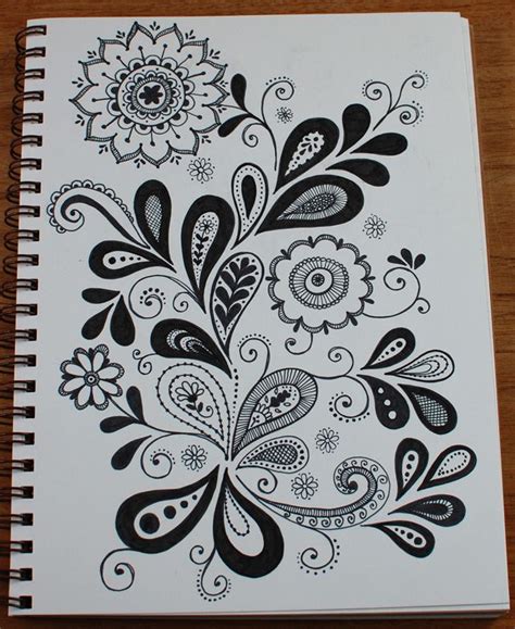 paisley/flower doodle...looks like folk are...might be gorgeous in color too... Zentangle ...