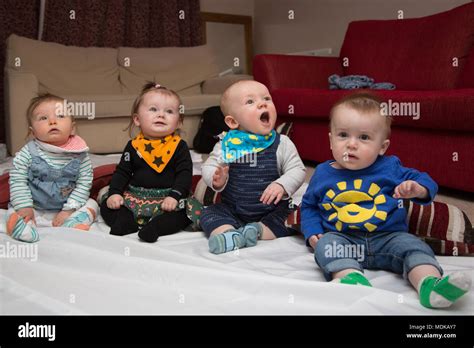 Babies playing together hi-res stock photography and images - Alamy