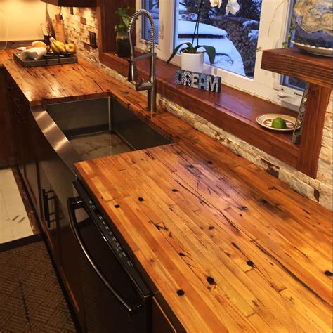 Beautiful Kitchen Remodel Using Reclaimed Butcher Block Flooring and Reclaimed Dimensional Wood